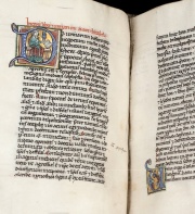 Image of two facing pages of the illuminated manuscript of "Isagoge", fols. 42b and 43a. On the top of the left hand page is an illuminated letter "D" - initial of "De urinarum differencia negocium" (The matter of the differences of urines). Inside the letter is a picture of a master on bench pointing at a raised flask while lecturing on the "Book on urines" of Theophilus. The right hand page is only shown in part. On its very bottom is an illuminated letter "U" - initial of "Urina ergo est colamentum sanguinis" (Urine is the filtrate of the blood). Inside the letter is a picture of a master holding up a flask while explaining the diagnostic significance of urine to a student or a patient. HMD Collection, MS E 78.