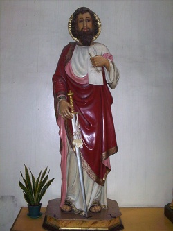 A statue of Paul holding a scroll (symbolising the Scriptures) and the sword (symbolising his martyrdom)